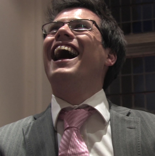 An-Instant-Talking-Point Person in glassess amazed